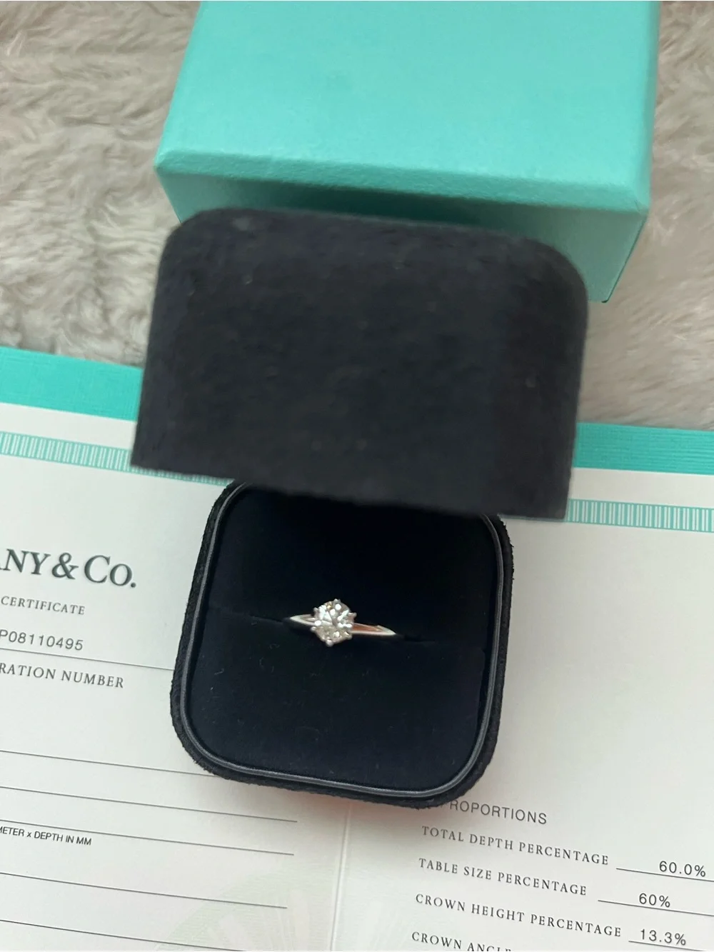Tiffany & Co. Silver Solitaire Ring with Central Diamond
